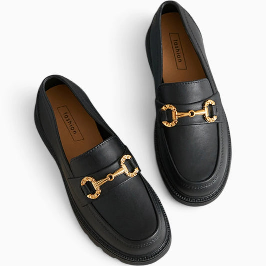 Paire de mocassins souples noirs avec tête ronde et finition élégante