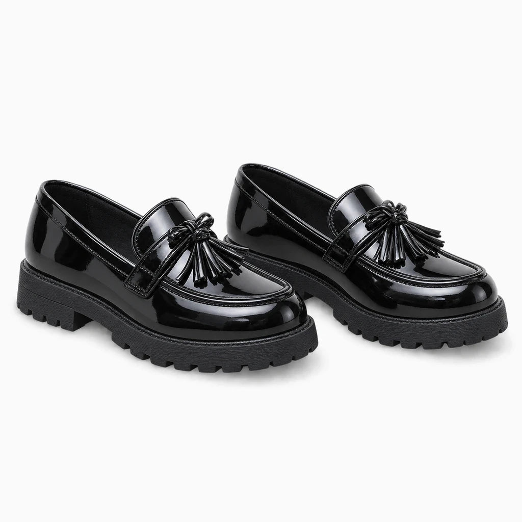 Mocassin fille noir avec nœud papillon et pompon, dessus lisse et brillant