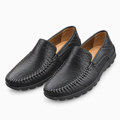 Chaussures slipper noires sans lacets, coupe sobre et épurée pour le bureau