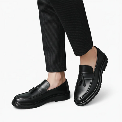 Semelle épaisse du mocassin homme avec pompon pour un confort optimal