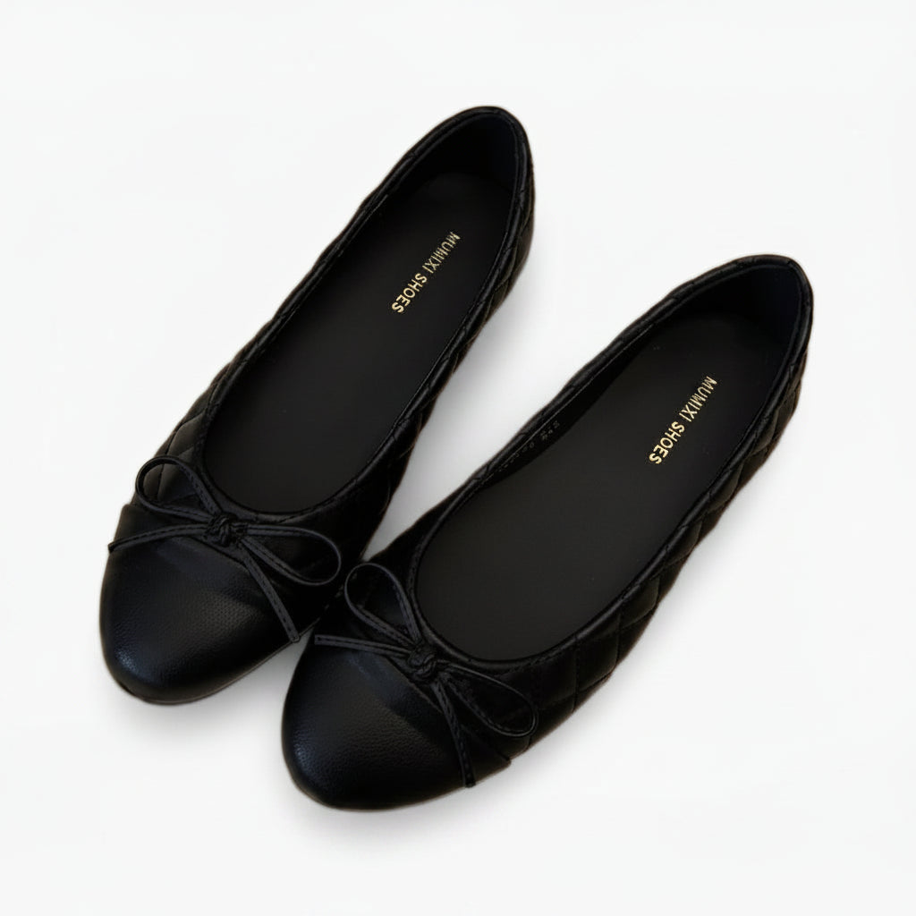 Mocassin boucle femme bicolore avec nœud papillon délicat et bout rond