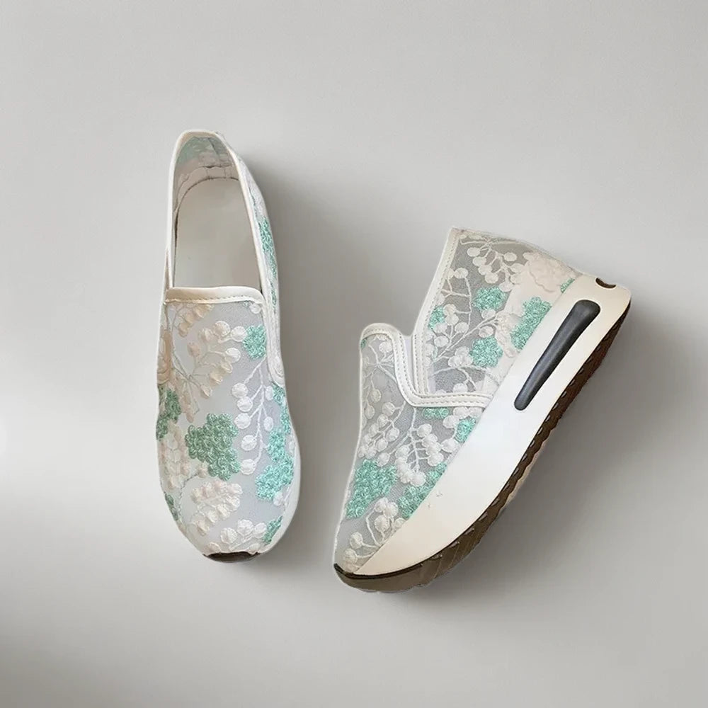 Mocassin femme classé en vert clair avec construction souple et légère