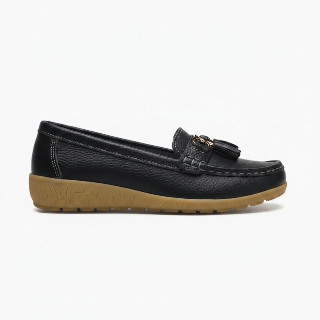 Mocassin doré avec pompon métallique et finition brillante