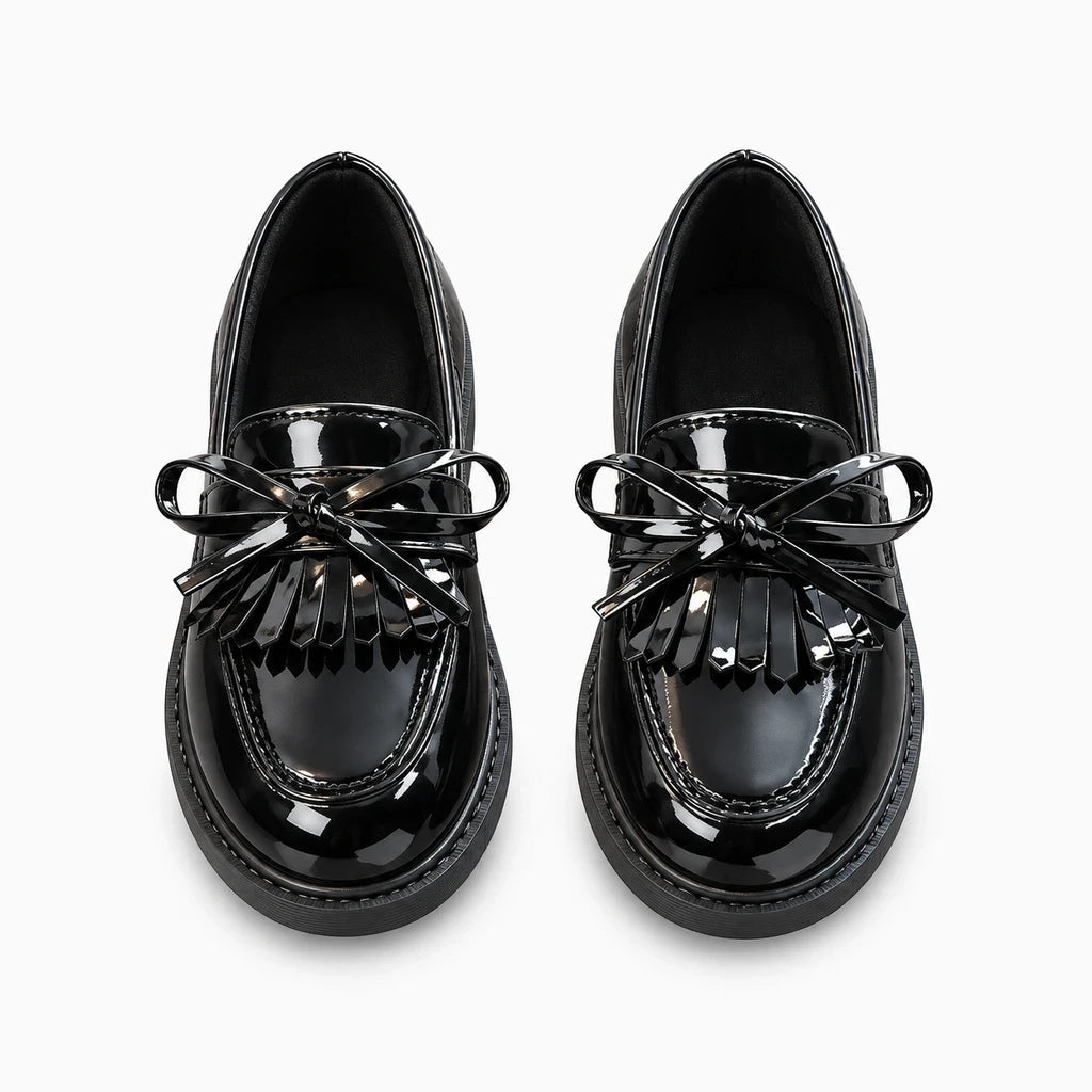 Mocassin noir fille souple et confortable, adapté aux mouvements du pied