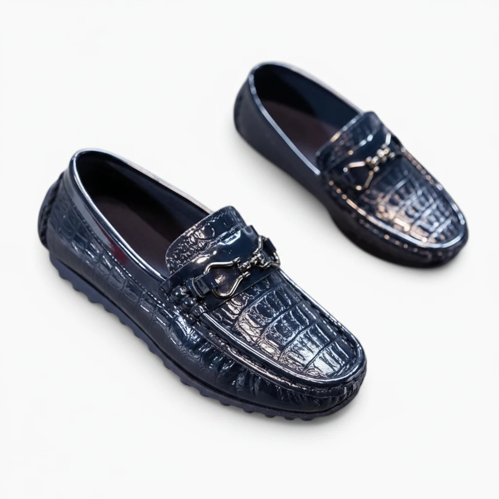Paire de mocassins garçon noirs bicolores pour l'école