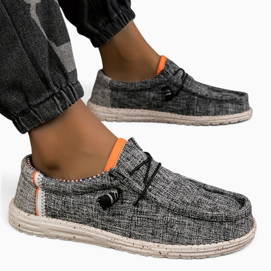Mocassin gris homme en toile respirante, vue de profil avec semelle vulcanisée