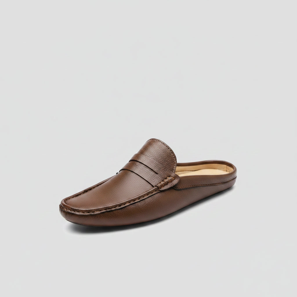 Mocassin habillé homme en cuir marron, vue de profil avec détail de la semelle