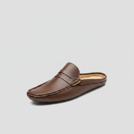 Mocassin habillé homme en cuir marron, vue de profil avec détail de la semelle