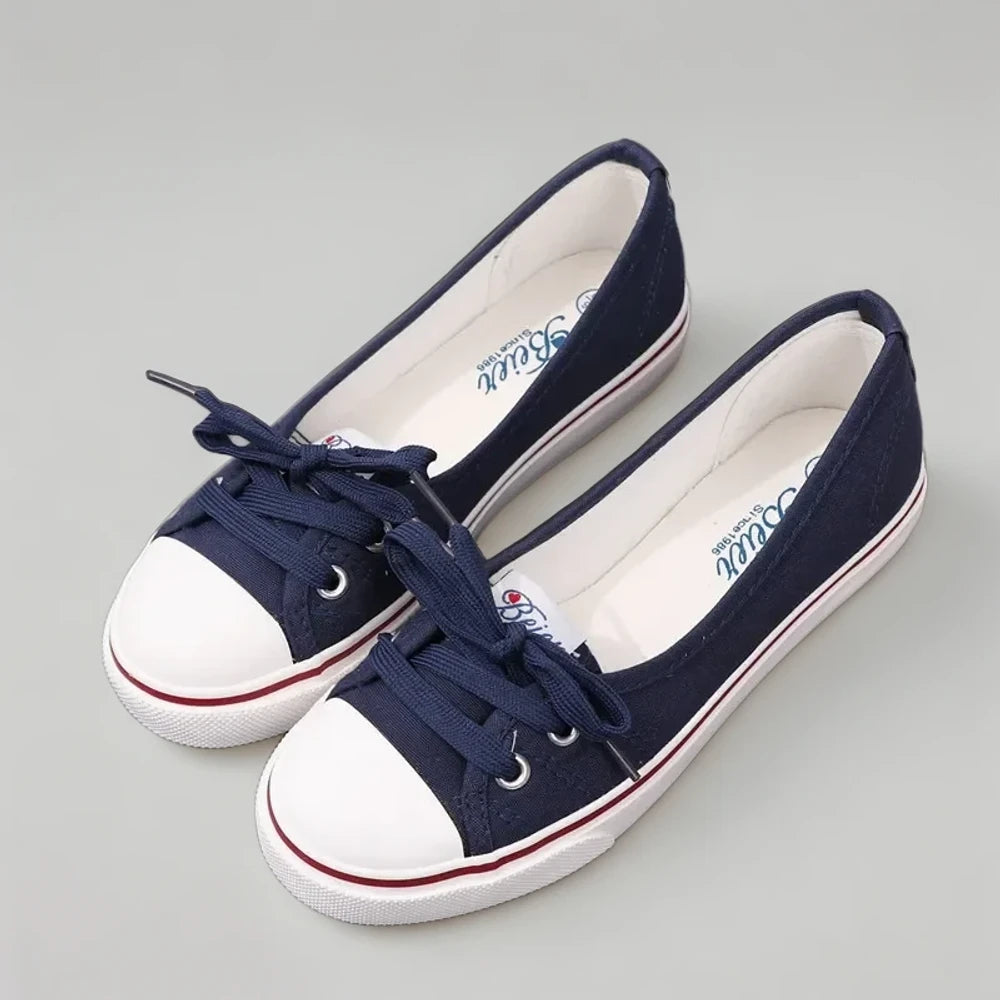 Mocassin penny blanc en toile respirante, idéal pour les courses et balades