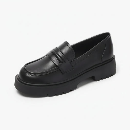 Mocassin plat femme noir avec semelle épaisse et bout rond élégant
