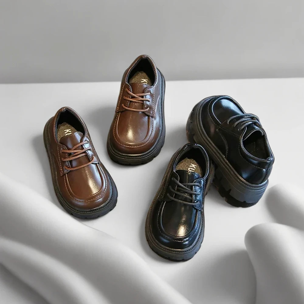 Chaussure mocassin tressée noir flexible pour enfant actif