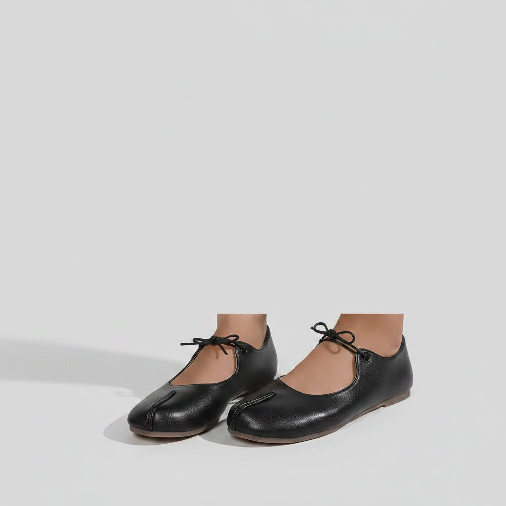 Mocassins à picots femme noirs avec nœud papillon et talon plat