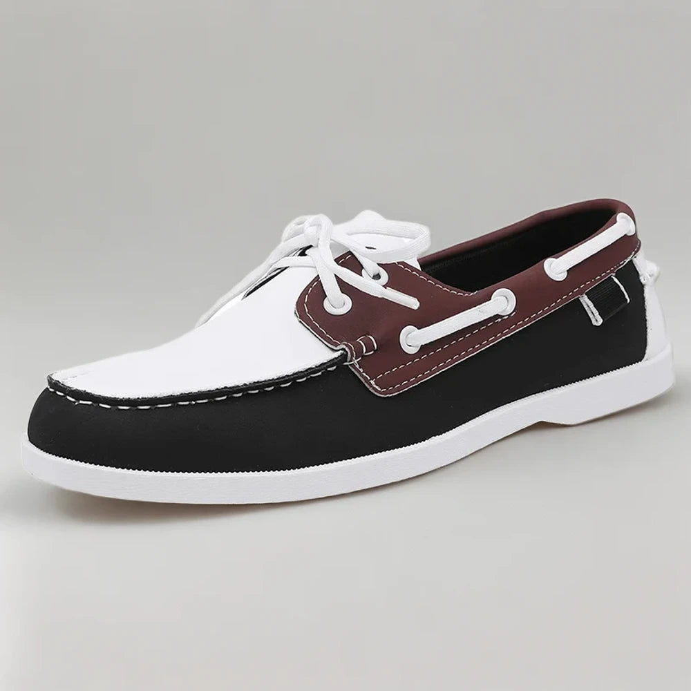 Mocassins bicolores homme noir avec détails contrastants dessus