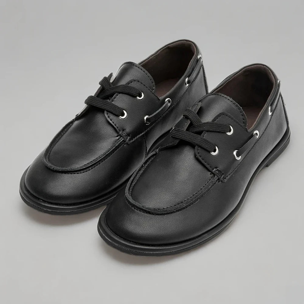 Chaussure mocassin daim noir, bout arrondi pour femme élégante