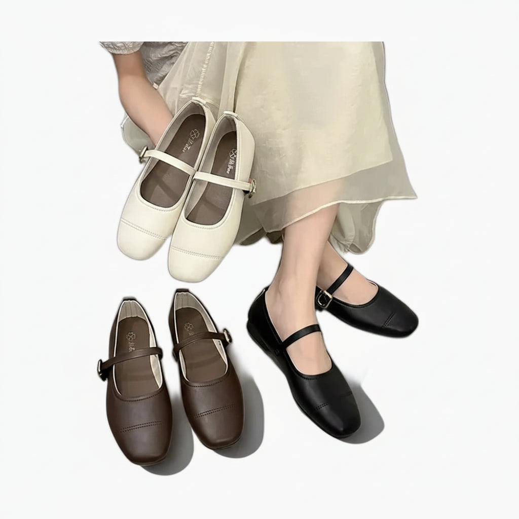 Mocassins femme mode noirs avec boucle distinctive et bout carré