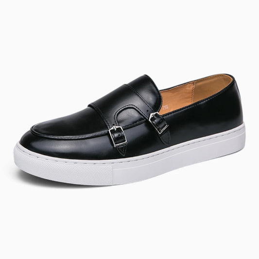 Mocassin en croûte de cuir noire, vue de profil avec silhouette épurée