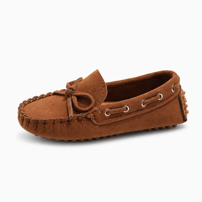 Mocassin pour enfant bleu marine avec nœud décoratif sur le dessus, semelle antidérapante